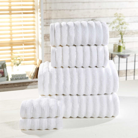 High-quality 6-piece towel set including face cloths, hand towels, bath towels, and bath sheets with plush ribbed texture
