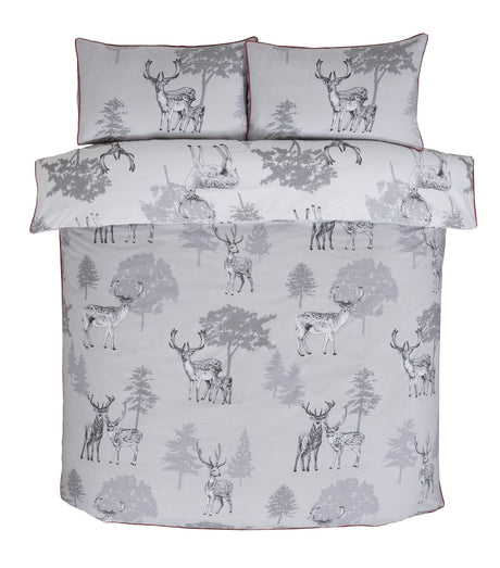 Detailed view of Sherwood Duvet Set showcasing nature-inspired artwork and contrasting border
