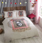 A quirky antique stag head duvet set featuring a framed collage of effect designs, adding personality and fun to your bedroom decor