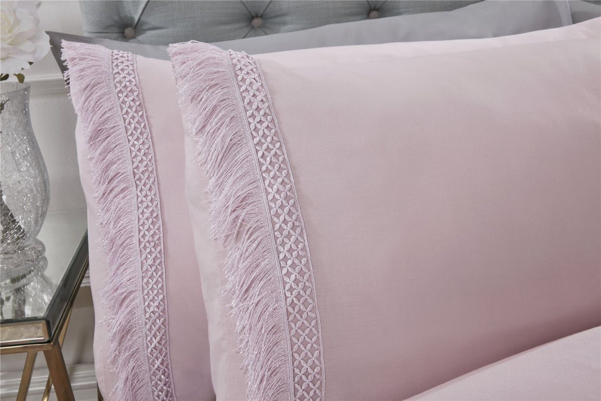 Single size Tia Trellis duvet cover with button closure and decorative lace fringe along the edges