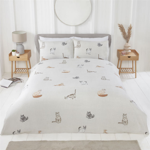 Stylish cat-themed duvet set featuring hand-drawn kitties on textured ground with reversible stripe design