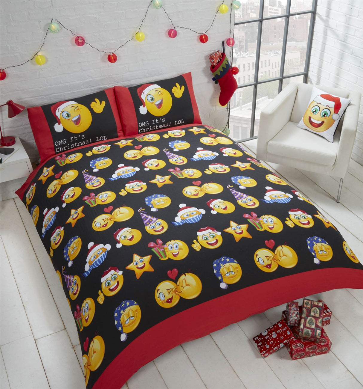 A colourful, reversible Christmas Icons duvet set featuring cheerful emoticons on bold black and white backgrounds, including matching pillowcases, with popper closures and easy-care fabric
