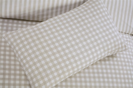 A neatly made bed dressed with the Gingham Check Duvet Set, highlighting its classic style and comfort