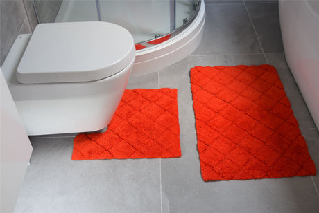 Soft plush diamond-patterned bath mat from the 2-piece Kyra set, perfect for absorbing water