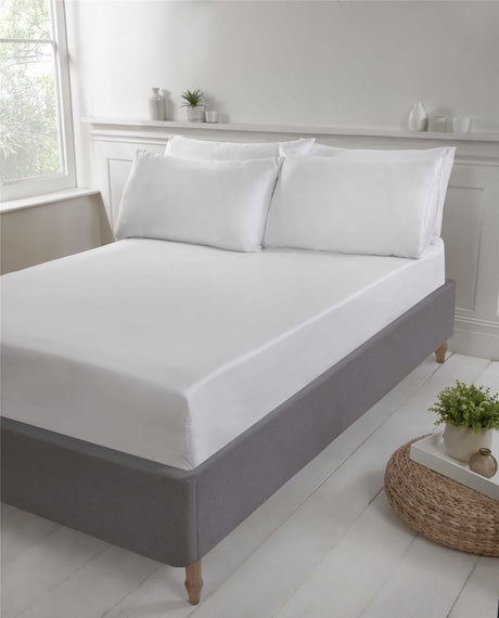 A luxurious deep-fit fitted sheet in sustainable BCI cotton with recycled polyester, designed for a 16-inch deep mattress, featuring easy-care, non-iron, soft percale fabric in eco-friendly plastic-free packaging