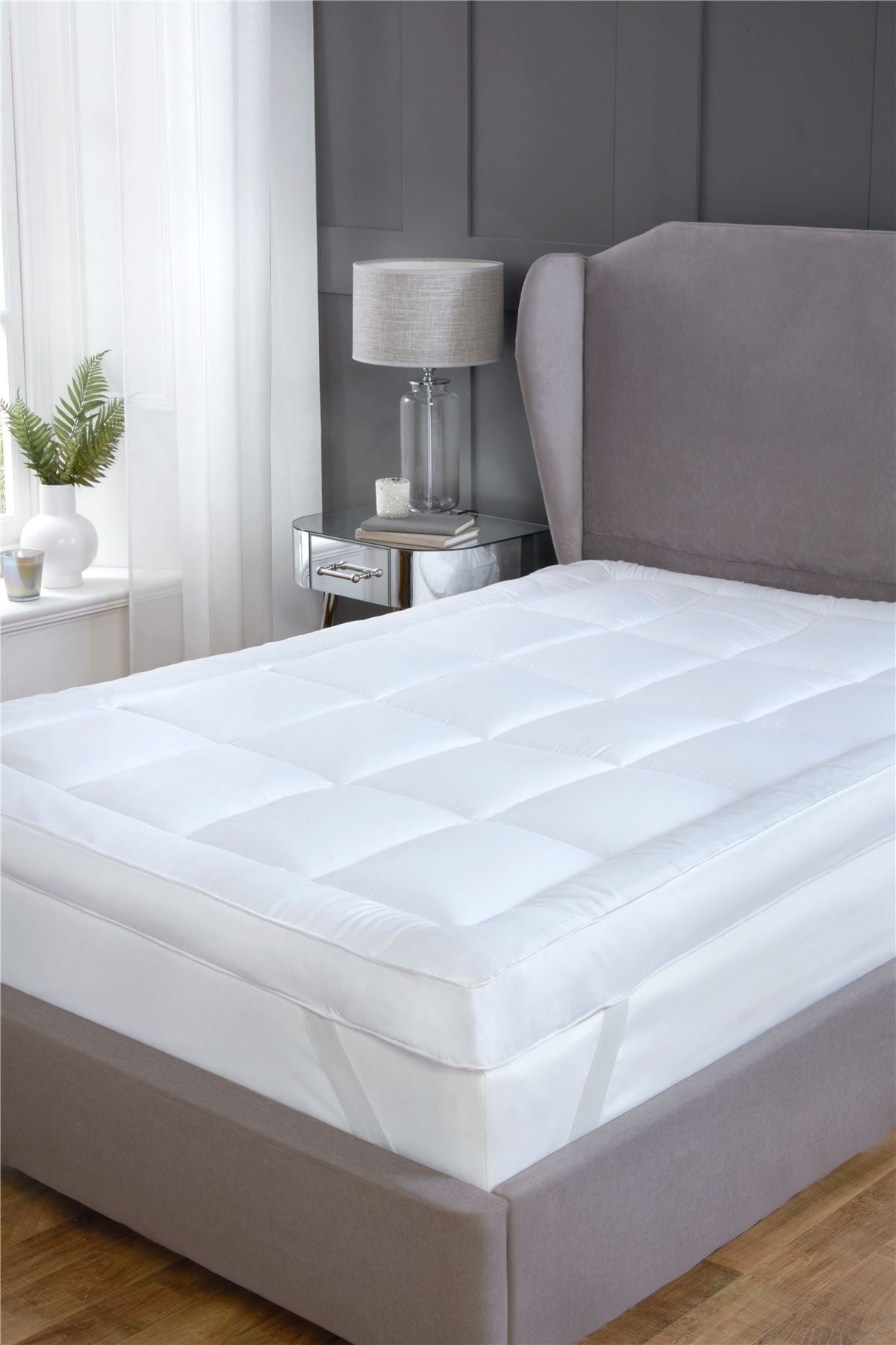 Luxurious microfibre fabric mattress topper offering enhanced comfort and sleep quality