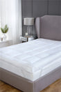 Luxurious microfibre fabric mattress topper offering enhanced comfort and sleep quality