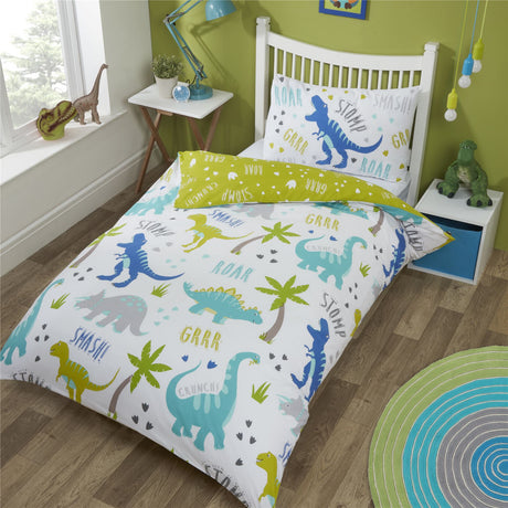 A colourful dinosaur-themed duvet set featuring playful illustrated dinosaurs on a white background, fully reversible with a green contrasting side, matching pillowcase with words stomp, roar, smash and grrr, and a popper closing mechanism