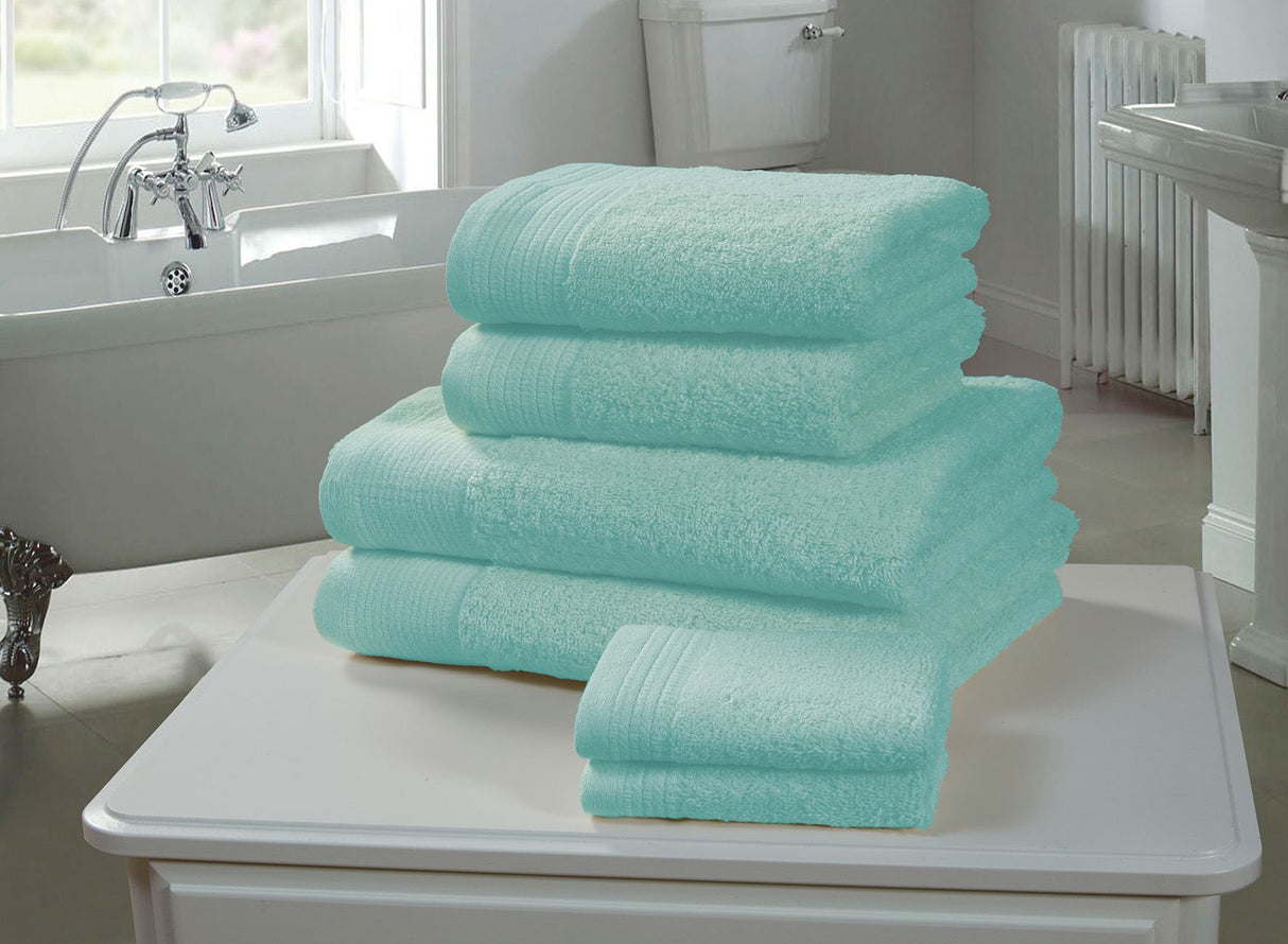 Illustration of a thick, lofty pile of turquoise bath towel made from 100% combed 600gsm cotton, extremely soft and super absorbent, ensuring durability and long-lasting quality