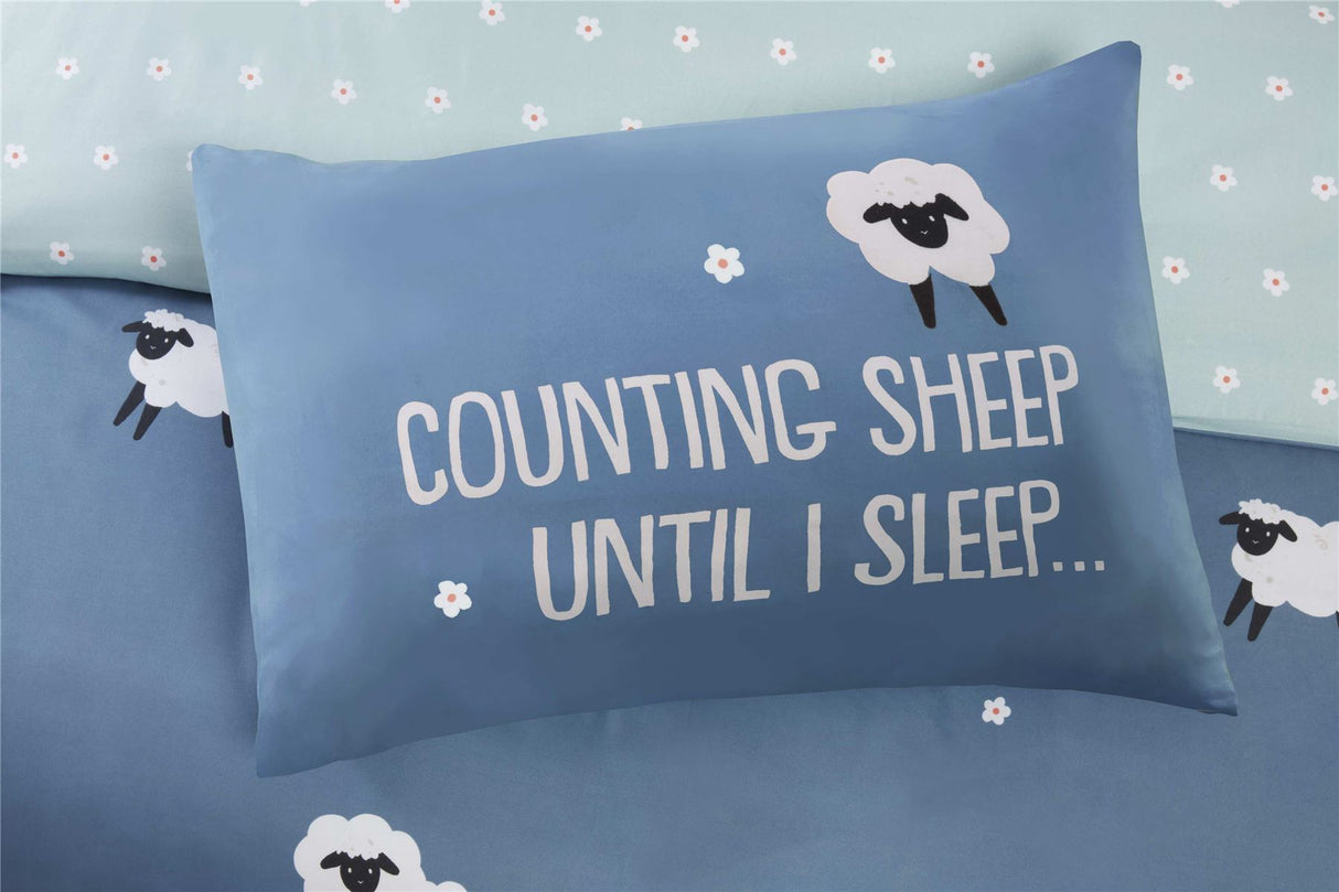 Soft and durable microfibre duvet cover set with quirky sheep print on a blue background, includes matching pillowcases