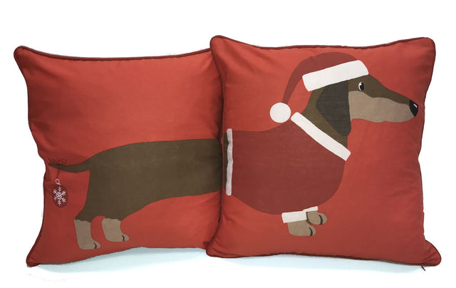 A reversible 43x43cm cushion with a cute sausage dog design