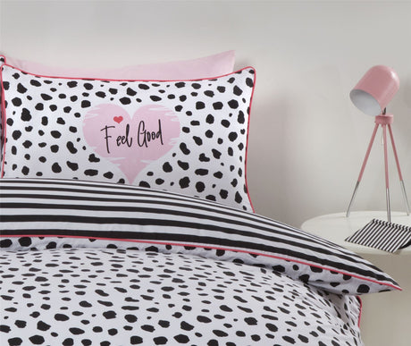 Modern dalmation duvet set with multicoloured ombre shades, reversible feature, and stylish pink trim