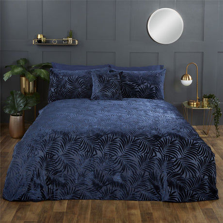 Elegant Paloma Duvet Set showcasing navy blue tropical palm leaf design with button closure
