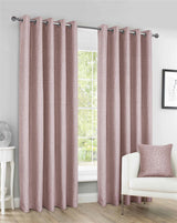 Tonal textured leopard spot jacquard curtains with eyelet headers