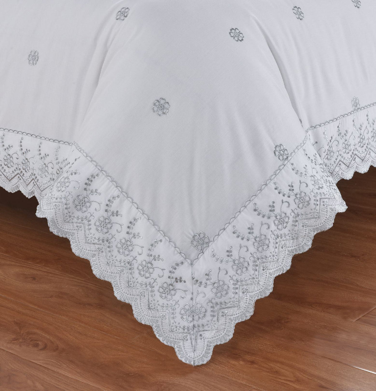 Close-up of the Gabrielle Duvet Set highlighting detailed floral embroidery and graceful lace accents