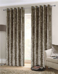 Pair of crushed velvet curtains with energy efficient lining and eyelet headers