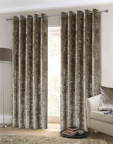 Pair of crushed velvet curtains with energy efficient lining and eyelet headers