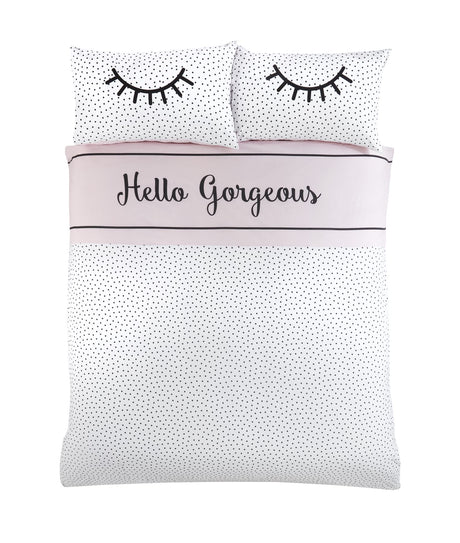Set includes matching pillowcases and duvet cover in playful eyelash and polka dot pattern, featuring easycare fabric