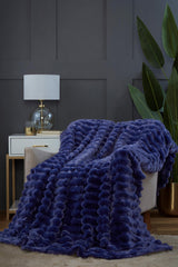 Close-up of plush rabbit fur polyester fleece fabric in deep, rich colour for elegant home décor