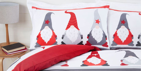 Close-up of the Festive Gonks Duvet Set showcasing a playful design with simple, festive colours and gonk illustrations for a sophisticated holiday bedroom look