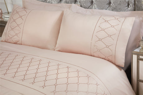 Opulent Monaco duvet set showcasing satin material and geometric sequin embellishments with matching pillowcases
