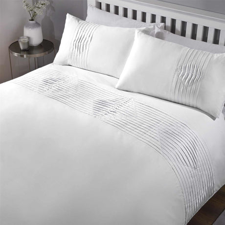 The Boston Duvet Set showcases a sleek, modern design with button closure and matching pillowcases in various sizes including double, kingsize, and superking