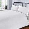 Full view of the classic cotton flat sheet draped neatly to highlight its soft, durable 200 thread count quality