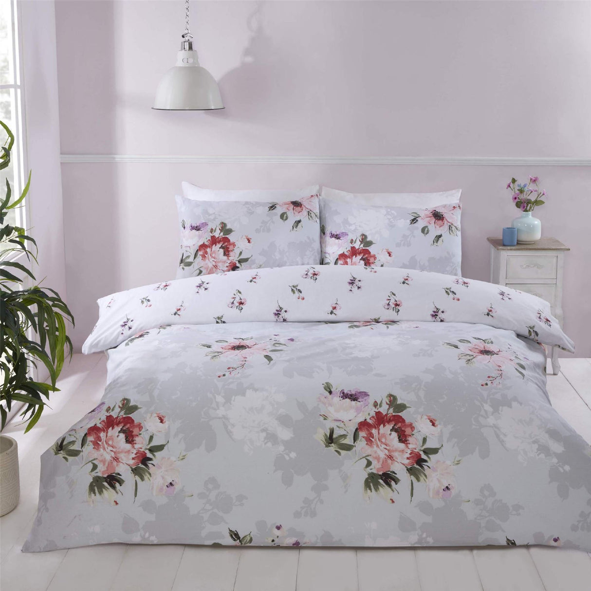 Elegant Margo duvet set featuring a painterly floral brush stroke pattern in soft grey hues with a ditsy rose bud reverse