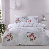 Elegant Margo duvet set featuring a painterly floral brush stroke pattern in soft grey hues with a ditsy rose bud reverse