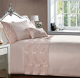 Luxurious Valencia Boudoir cushion featuring contrasting matte satin fabric with chevron pleating band across a poly cotton base