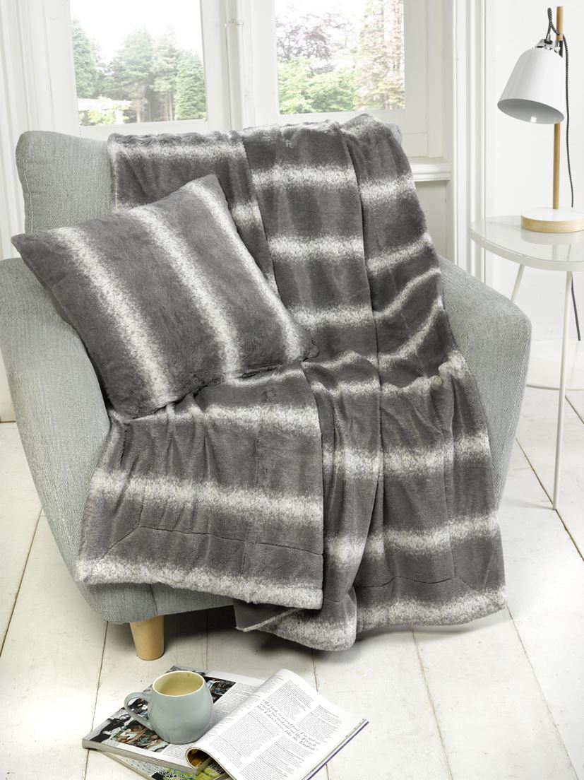 Soft and luxurious faux-fur Husky Filled Cushion 43X43Cm, perfect for cosying up in downstairs or upstairs rooms, or adding a touch of elegance to your bed