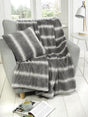 Soft and luxurious faux-fur Husky Filled Cushion 43X43Cm, perfect for cosying up in downstairs or upstairs rooms, or adding a touch of elegance to your bed