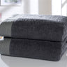 Luxurious tidal towel with herringbone border detailing in 100% cotton fabric