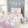 A colourful birds houses duvet set featuring birds, flowers, and birdhouses perfect for a child's bedroom decor