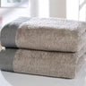 Set of two large bath towels measuring 70x120cm with ultra-soft 550gsm cotton and textured border design
