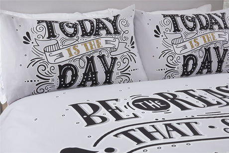A Todays The Day Duvet Set with printed pillowcases displaying motivational words and a duvet cover, featuring a popper closing mechanism for easy use