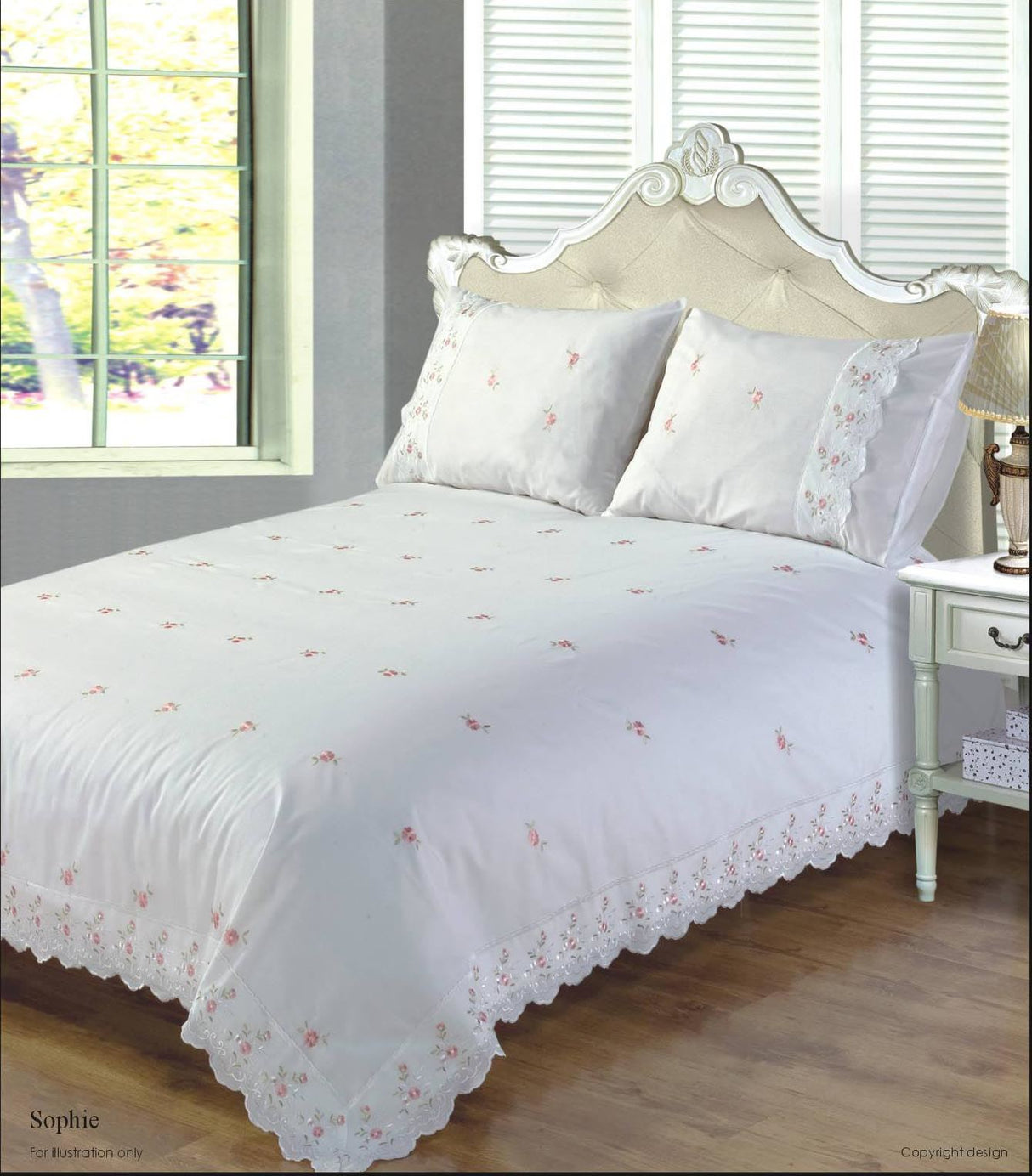 Intricately embroidered rose patterns on cream duvet cover with lace trim