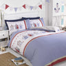 A vintage-inspired beach hut duvet cover featuring nautical blue and red colours with matching pillowcases