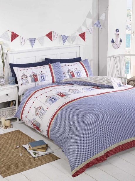 A vintage-inspired beach hut duvet cover featuring nautical blue and red colours with matching pillowcases