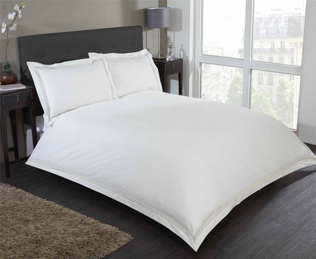 Elegant Mayfair Duvet Set showcasing modern minimalist style with embroidered rectangular border detail on duvet cover and matching pillowcases