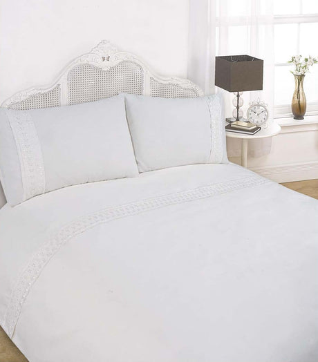 Beautifully designed Sorrento Duvet Set showcasing a simplistic style with intricate lace accents on duvet header and pillowcases