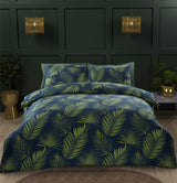 Luxurious Palma Duvet Set featuring tropical green palm leaf design on navy background, made from soft 180 thread count microfibre for a cosy, non-iron sleep experience