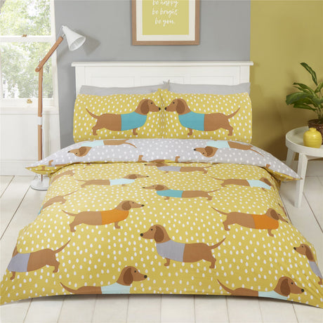 Bright yellow duvet cover featuring playful dachshund illustrations on a polka dot background with a grey reverse