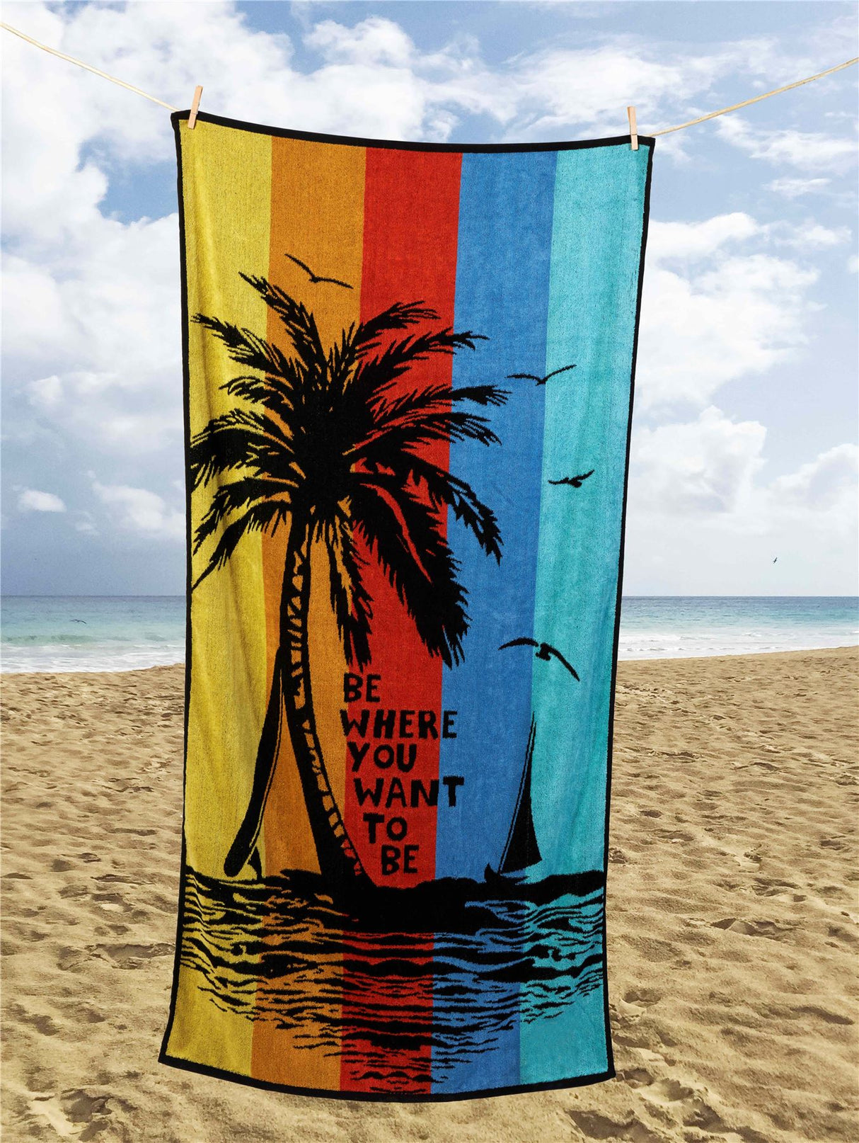 A large 85x160cm palm tree beach towel featuring a tropical island design, ideal for poolside or beach use, made from durable and absorbent blended cotton, perfect for gifting