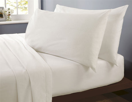 Elegant brushed cotton flat sheet featuring a cosy, heat-retaining fabric in a warm beige tone