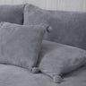 Soft and cozy Pom Pom Fleece Filled Cushion measuring 43X43cm