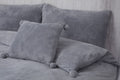Soft and cozy Pom Pom Fleece Filled Cushion measuring 43X43cm