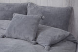 Soft and cozy Pom Pom Fleece Filled Cushion measuring 43X43cm
