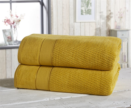 Six-piece royal velvet towel set comprising two face cloths, two hand towels, and two bath towels, all featuring a velvet textured design