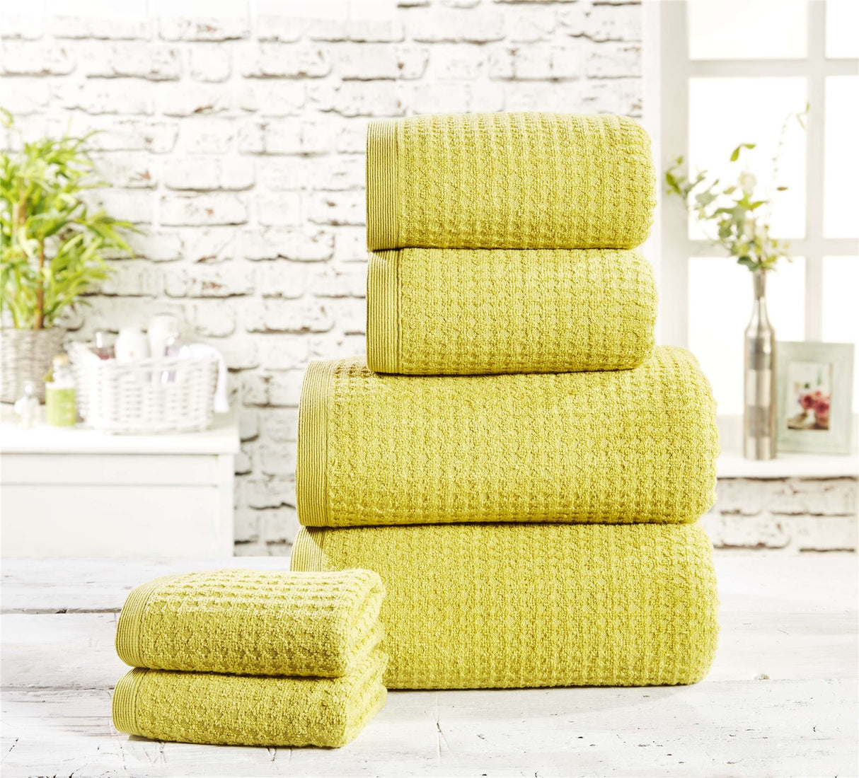 Soft and absorbent waffle weave towel in light beige color